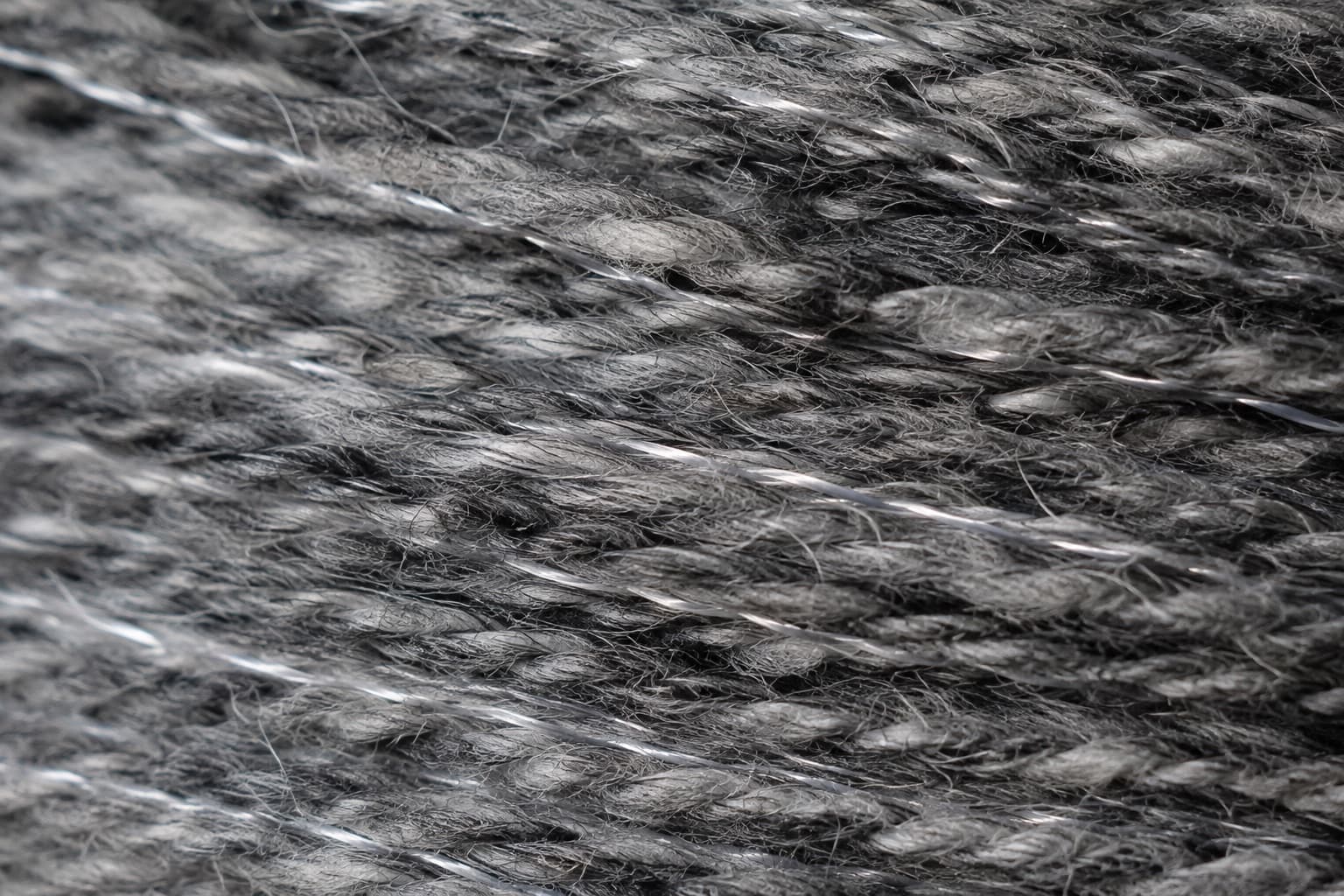 Macro photograph of the fabric, showing the yarn and weave structure at close range.